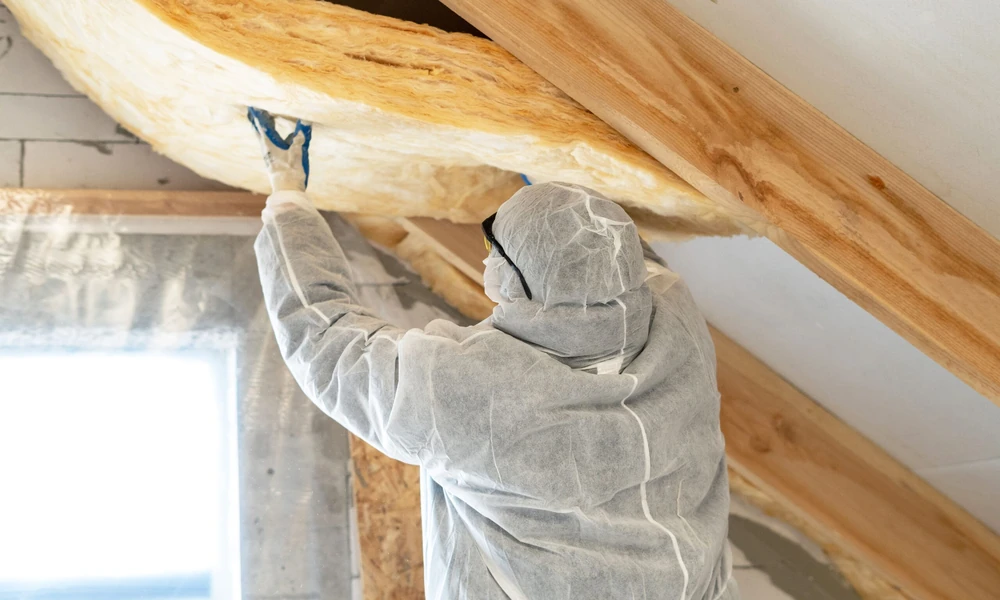 Glass Fibers Versus Recycled Paper Above Michigan Ceilings